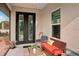 Screened porch with seating and access to backyard at 102 Linda Lee Dr, Rotonda West, FL 33947