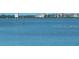 Calm water view with distant buildings at 102 Linda Lee Dr, Rotonda West, FL 33947