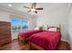 Bright guest bedroom with twin beds and water views at 101 N Marion Ct # 131, Punta Gorda, FL 33950