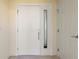 White interior door and adjacent hallway at 101 N Marion Ct # 131, Punta Gorda, FL 33950