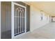 Building hallway with white walls and stone-like flooring at 101 N Marion Ct # 131, Punta Gorda, FL 33950