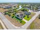 Aerial view showing a single-Gathering house near a waterway and other homes at 1020 Caliva St, North Port, FL 34286