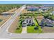 Aerial view of a single-Gathering home with a pool and large backyard, located near a canal at 1020 Caliva St, North Port, FL 34286