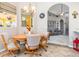 Casual dining area with wood table and chairs, near living room at 1020 Caliva St, North Port, FL 34286