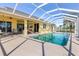 Inviting screened-in pool with spacious deck at 1020 Caliva St, North Port, FL 34286