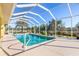 Relaxing screened-in pool and patio area at 1020 Caliva St, North Port, FL 34286