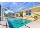 Sparkling screened-in pool with large deck at 1020 Caliva St, North Port, FL 34286