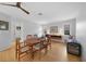 Light-filled dining area with hardwood floors and a wood table at 1029 San Mateo Dr, Punta Gorda, FL 33950