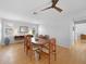 Bright dining room featuring a wood table and hardwood floors at 1029 San Mateo Dr, Punta Gorda, FL 33950