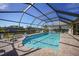 Relaxing screened pool area with canal views at 1029 San Mateo Dr, Punta Gorda, FL 33950