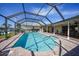 Inviting screened pool area with brick pavers and ample space for relaxation at 1029 San Mateo Dr, Punta Gorda, FL 33950