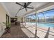 Covered patio overlooking the refreshing pool at 1029 San Mateo Dr, Punta Gorda, FL 33950