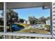 View of the community pool and pond from balcony at 1051 Forrest Nelson Blvd # M-203, Port Charlotte, FL 33952