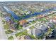 Aerial view of luxury waterfront homes with private docks at 1075 Messina Dr, Punta Gorda, FL 33950