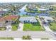 Aerial view of canal front home in sunny Florida community at 1075 Messina Dr, Punta Gorda, FL 33950