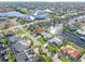 Aerial showing waterfront homes, community, and surrounding landscape at 1075 Messina Dr, Punta Gorda, FL 33950