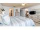 Bedroom with king-size bed and view of living area at 1075 Messina Dr, Punta Gorda, FL 33950