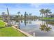 Waterfront property with dock and lush landscaping at 1075 Messina Dr, Punta Gorda, FL 33950