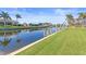 Serene view of the canal and neighboring properties at 1075 Messina Dr, Punta Gorda, FL 33950