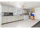 Laundry room with washer, dryer, and cabinets at 1075 Messina Dr, Punta Gorda, FL 33950