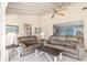 Cozy living room with two sofas and a coffee table, offering a view into other rooms at 1075 Messina Dr, Punta Gorda, FL 33950