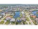 Aerial view of waterfront home in a luxury community at 1217 Spoonbill Dr, Punta Gorda, FL 33950