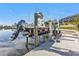 Convenient boat dock with lift for easy access to the water at 1217 Spoonbill Dr, Punta Gorda, FL 33950