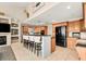 Open concept kitchen with island and breakfast bar at 1217 Spoonbill Dr, Punta Gorda, FL 33950