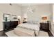 Bright and airy main bedroom with a stylish headboard and large windows at 1217 Spoonbill Dr, Punta Gorda, FL 33950