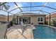 Enjoy this gorgeous pool and lanai area with outdoor seating at 13147 Preserve Ct, Port Charlotte, FL 33953