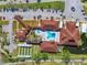 Overhead shot showcasing the clubhouse's pool, amenity center, and parking facilities at 136 Seaward Way, North Port, FL 34287