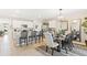 Dining room with wooden table, chairs, and a chandelier at 1422 Powell Valley Dr, Port Charlotte, FL 33953