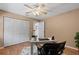 Bedroom with a ceiling fan, closet, desk, and chair provides a versatile space at 154 Catamaraca Ct, Punta Gorda, FL 33983