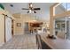 Dining room featuring view into kitchen, barn door, and seating for six at 154 Catamaraca Ct, Punta Gorda, FL 33983