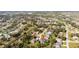 Aerial view of a sprawling residential area with a mix of homes, winding roads, and green spaces at 154 Catamaraca Ct, Punta Gorda, FL 33983