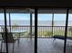 Spacious balcony with water views and seating area at 1601 Park Beach Cir # 125/11, Punta Gorda, FL 33950