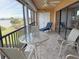 Balcony with seating area, overlooking the water at 1601 Park Beach Cir # 125/11, Punta Gorda, FL 33950