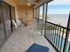 Spacious balcony with outdoor furniture and water view at 1601 Park Beach Cir # 125/11, Punta Gorda, FL 33950