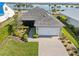 Attractive exterior with landscaped yard and two-car garage at 16928 Curry Preserve Dr, Punta Gorda, FL 33982