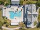 Resort-style pool with lounge chairs and adjacent clubhouse at 16928 Curry Preserve Dr, Punta Gorda, FL 33982