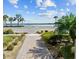 Brick walkway leading to a waterfront community at 16928 Curry Preserve Dr, Punta Gorda, FL 33982