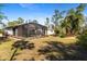 Screened patio and landscaped backyard at 1785 Nagorsky Ave, North Port, FL 34288