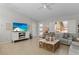 Living room with a flat-screen TV and light decor at 1785 Nagorsky Ave, North Port, FL 34288