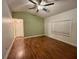 Spacious living room with hardwood floors and high ceilings at 18085 Wintergarden Ave, Port Charlotte, FL 33948