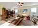 Comfortable living room featuring a neutral color palette and ample natural light at 1811 Scarlett Ave, North Port, FL 34289