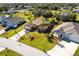 Aerial view of a light pink house in a residential neighborhood at 183 Castile Ct, Punta Gorda, FL 33983