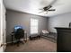 Bedroom with a full-size bed, desk, and ceiling fan at 183 Castile Ct, Punta Gorda, FL 33983