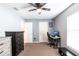 Bedroom with a desk, double closets and ceiling fan at 183 Castile Ct, Punta Gorda, FL 33983