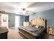 Main bedroom with a king-size bed, dresser, and ceiling fan at 183 Castile Ct, Punta Gorda, FL 33983