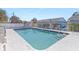 Refreshing community pool with steps and seating at 1956 Wyoming Ave # 0, Englewood, FL 34224